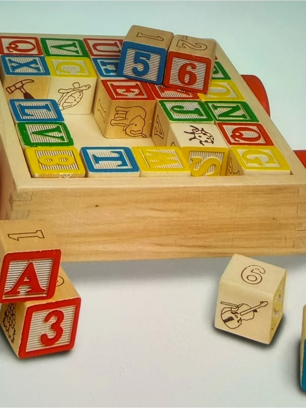 Wooden Alphabet & Number Pull Toy with Red, Blue, Green, Yellow Blocks